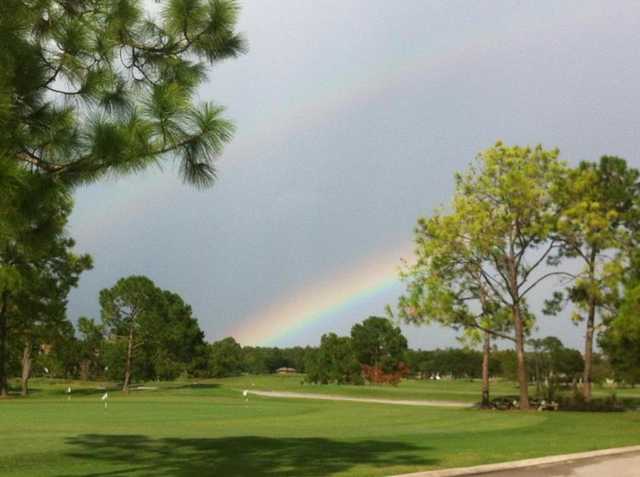 A view of rainbow over the practice area at Hunter's Creek Golf Club