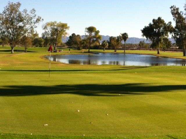 A view of green with water coming into play at Rivers Edge Golf Course