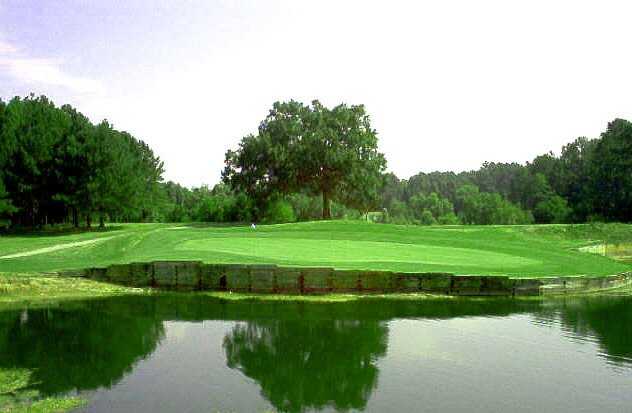 A view over the water of a green at LinRick Golf Course