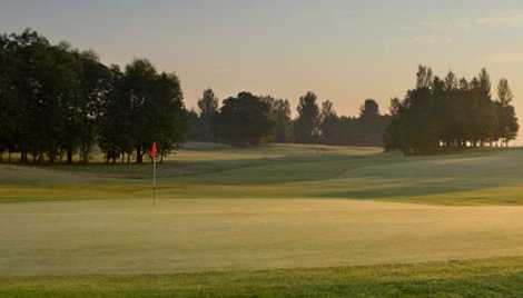 A sunny view of green at Spey Valley Golf Course