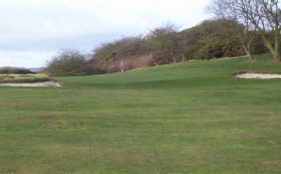 A view of the 2nd green guarded by bunkers at Auchterderran Golf Club