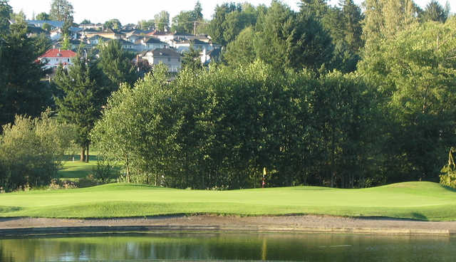 A view over the water of a green at Guildford Golf and Country Club