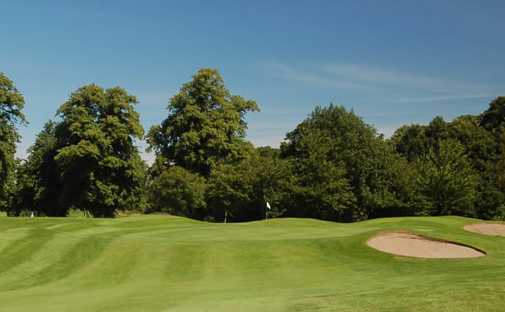 A view of green guarded by bunkers at Royal Musselburgh Golf Club