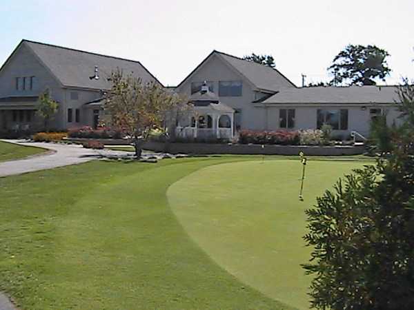 A view of the clubhouse and putting green at Woodbine Golf Course