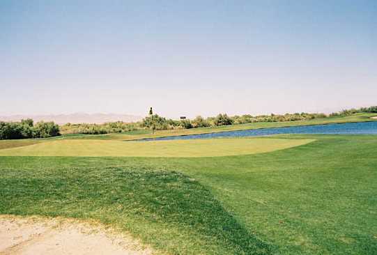 A view of green #8 with water coming into play at Mojave Resort Golf Club