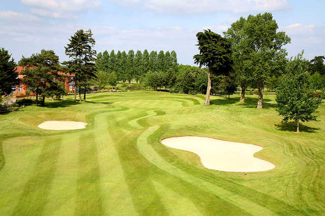 A view of the 18th green at Sand Martins Golf Club