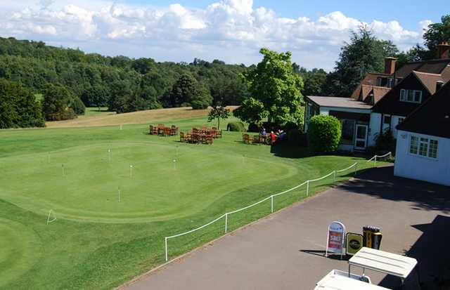 A view of the clubhouse and putting green at Temple Golf Club