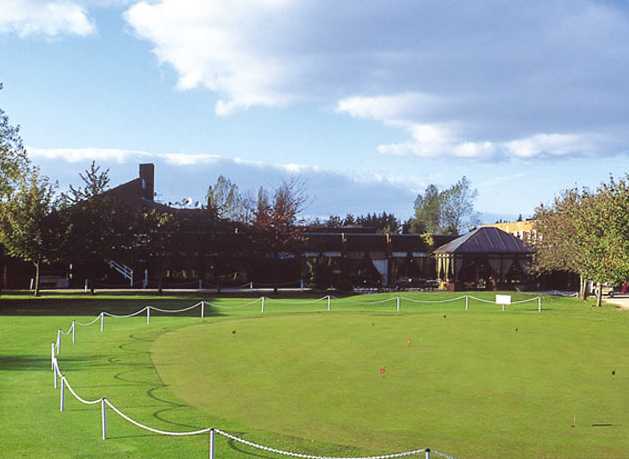 A view of the clubhouse and putting green at The Cambridgeshire Golf Club
