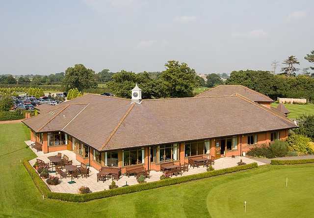 A view of the clubhouse and putting green at Eaton Golf Club