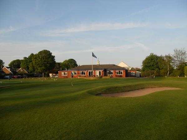 A view of the 18th green and clubhouse in background at Widnes Golf Club