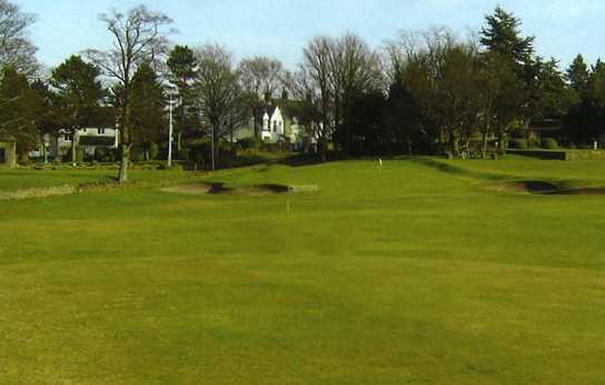 A view of green protected by bunkers at Hallowes Golf Club