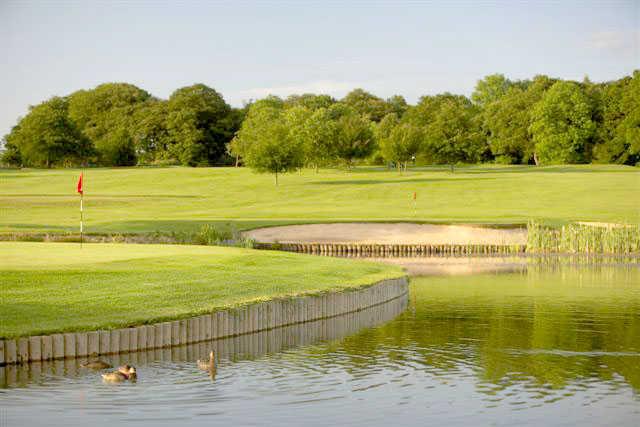 A view of green surrounded by water at Morley Hayes Hotel & Golf