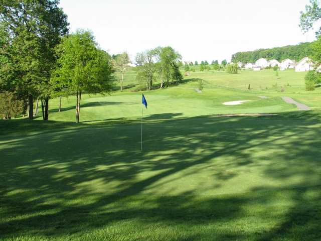 A beautiful view of the fairway and green from Pilgrim's Oak Golf Course