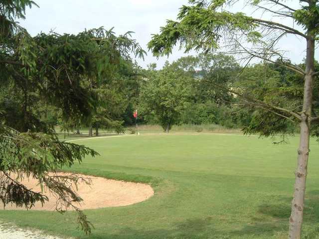 A view of green guarded by bunker at Forrester Park Golf & Country Club