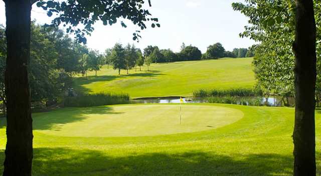 A view of a green with water coming into play at Brentwood Golf Club