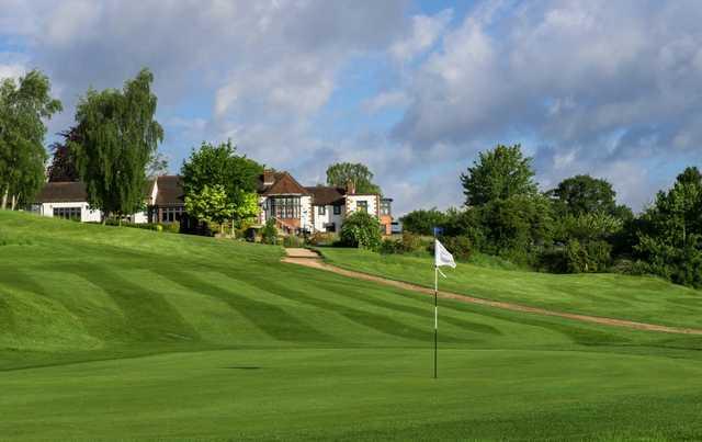 A greenside view of the clubhouse at Addington Court Golf Centre