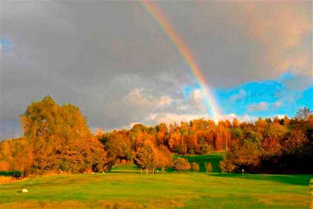 A view of rainbow over the 9th hole at Brookdale Golf Club