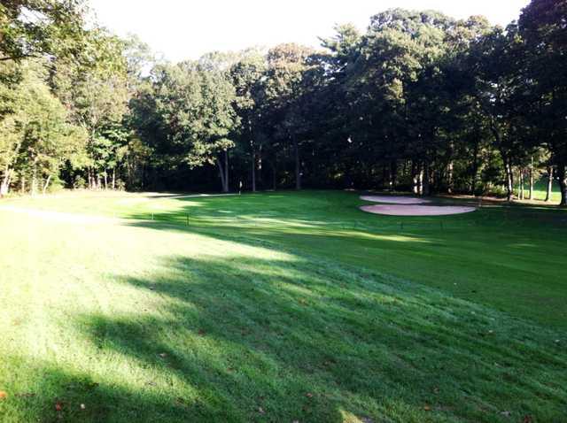 A view of the green an bunkers at Dix Hills Park Golf Course