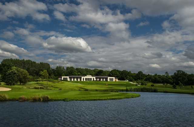 A view over the water of the clubhouse at Shire London