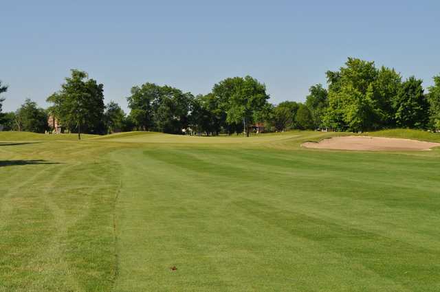View of a green and bunker at Hawk's Tail of Greenfield