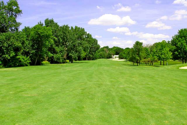 View of the 4th fairway and green in the background at River Bend Golf Course