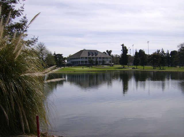 View of the clubhouse and the lake at Manteca Park Golf Course