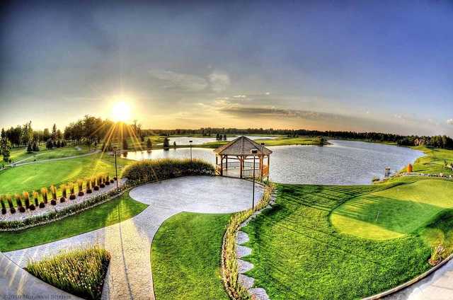 Sunset view of the gazebo and lake at Solitude Links Golf Course & Banquet Center