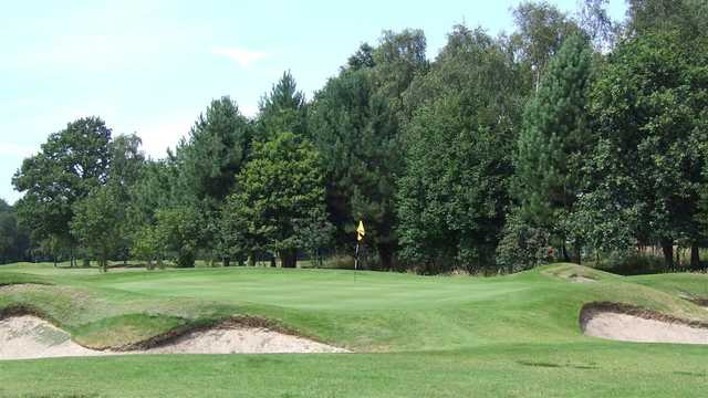 A view of a green surrounded by bunkers at Ormskirk Golf Club
