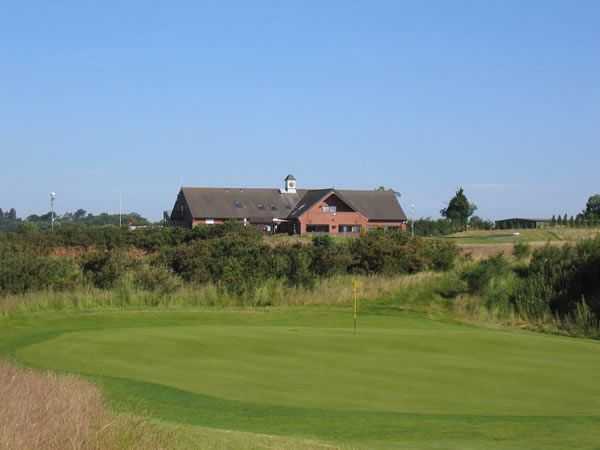 View looking over to the clubhouse across one of Kilworth Springs immaculate greens 