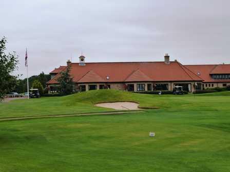 A view of hole #18 and clubhouse at Oaks Golf Club