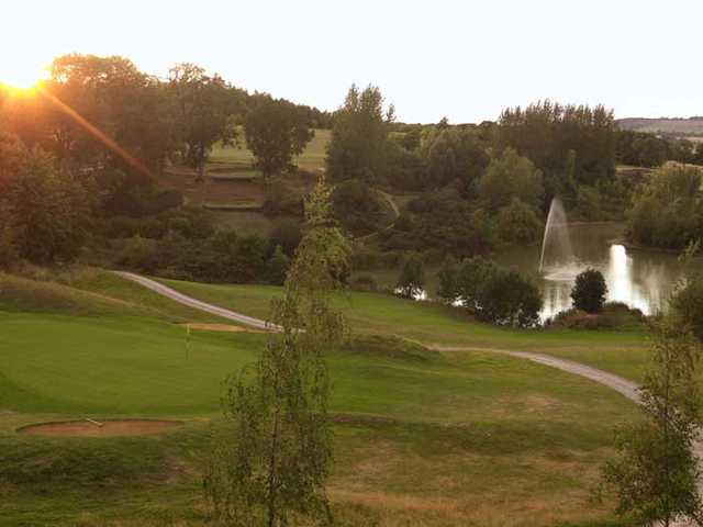 A sunny view of a hole at Hellidon Lakes Golf & Spa Hotel.