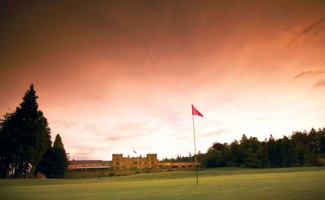 A view of a green with the clubhouse in background at Slaley Hall Hotel & Golf