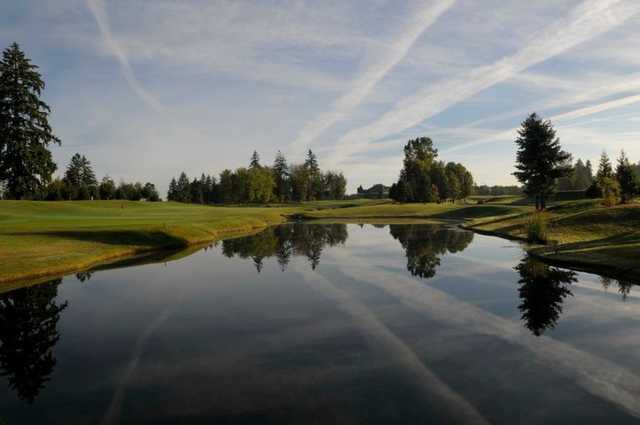 South at Reserve Vineyards #10: Right down the middle is where you want to keep your drive. A creek cuts across the fairway and then runs along the left side to a green side small lake. Grass mounds and a bunker are to the right and back right.