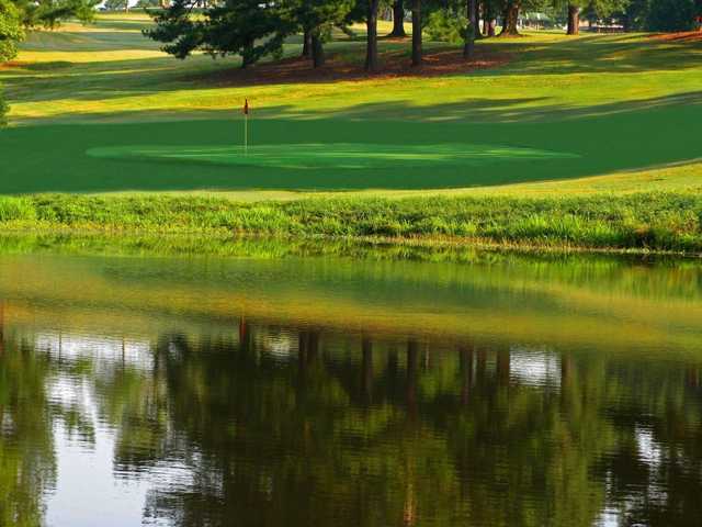 A view over the water of a green at River Bend YMCA Golf Course