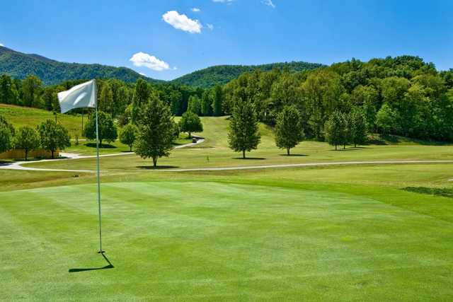 A view of a hole with undulating cart paths in background at Wild Laurel Golf Course