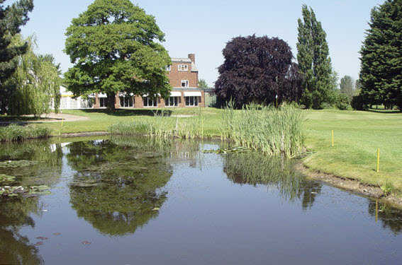 A view over the pond of the clubhouse at Shrewsbury Golf Club