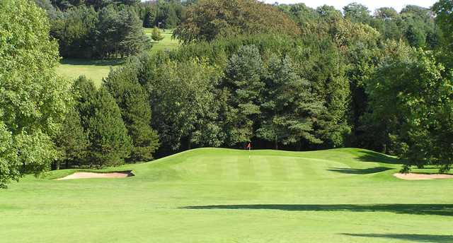 A view of green #14 flanked by bunkers at Mendip Course from Mendip Golf Club