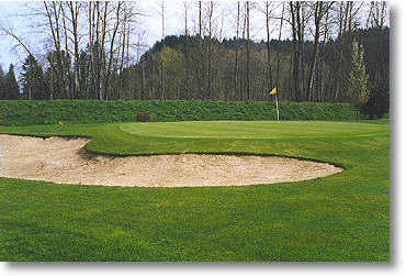 Hole #5 has one green side bunker to the left. Watch where your ball goes if you use too much club on this one. The rough at the back of the green is very high and has claimed many errant shots.