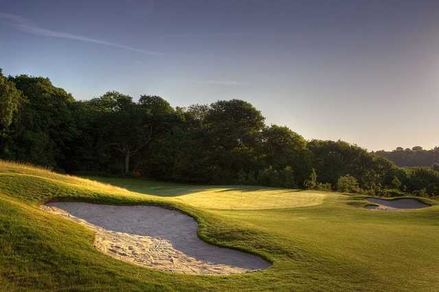 A view of the 2nd green guarded by tricky bunkers at Blue Course from Farleigh Golf Club