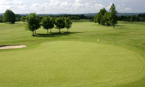 A view of the 6th green at Hurtmore Golf Club