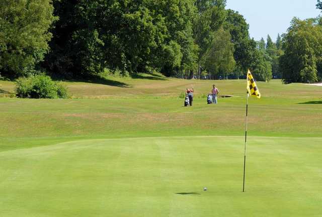 A greenside view of the fairway at the Cocks Moors Woods Golf Club