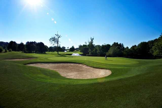 The stunning 16th hole and water feature in the sunshine at  Chartham Park Golf Club