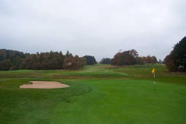 A view of a green protected by bunker at Bradford Golf Club