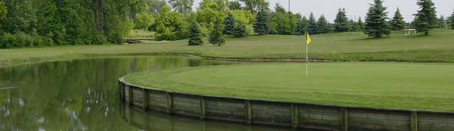 View of the signature 17th island green at Hickory Creek Golf Course