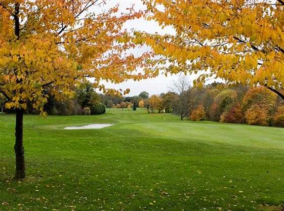 An autumn view of a green at Redditch Golf Club