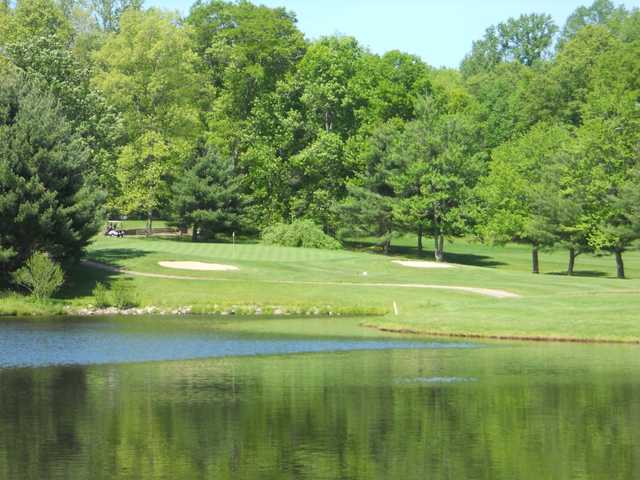 View of green #7 and lake at Woodhaven Country Club