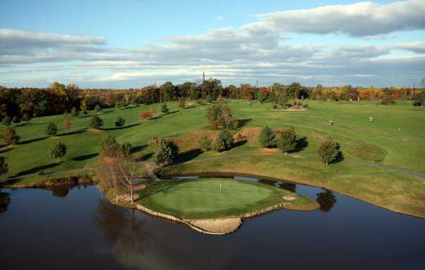 Aerial view of a green surrounded by water at Island Green from Meadows Farms Golf Course