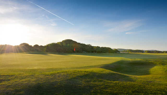 A sunny view of the 10th hole at Pyle and Kenfig Golf Club