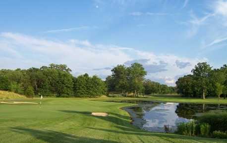 A view of a green with water coming into play at Valley Brook Golf Course