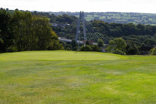 A view of a green with a bridge in background at Blackwood Golf Club